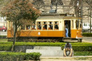 Portugal, Porto City: trolley with guy using his cell phone