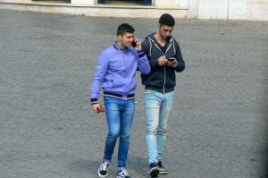Portugal, Porto City: young guys with phones