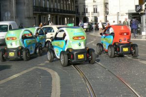 Portugal, Lisbon: modern version of tuk-tuks