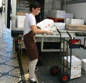 Portugal, Lisbon: unloading restaurant goods