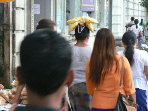 Burma, Rangoon: carrying bananas