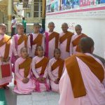 Burma, Rangoon; Shwedagon Pagoda; nuns posing