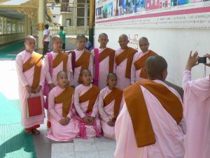 Burma, Rangoon; Shwedagon Pagoda; nuns posing