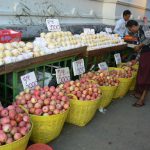 Burma, Rangoon: fruit stand adjacent to Strand Hotel