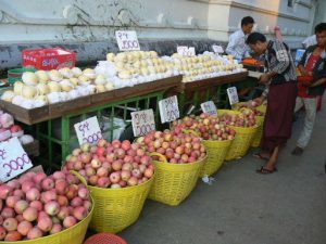 Burma, Rangoon: fruit stand adjacent to Strand Hotel