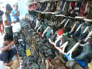 Burma, Rangoon: shoe store along the street