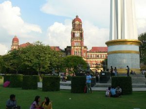 Burma, Rangoon: Mahabandoola Park with red  brick High Court and