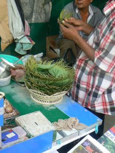 Burma, Rangoon: making grass items (?)