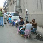 Burma, Rangoon: lunch time for construction workers
