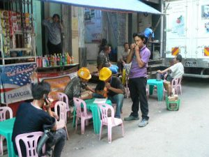 Burma, Rangoon: break time for workers