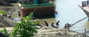 Burma, Mandalay: kids playing by Ayeyarwady River