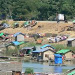 Burma, Mandalay: local village houses made of rattan with fiberglass tarps