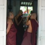 Burma, Mandalay  Maha Ganayon Kyaung Monastery; moment of relaxation