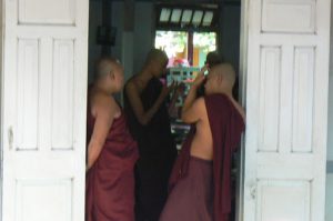 Burma, Mandalay  Maha Ganayon Kyaung Monastery; moment of relaxation