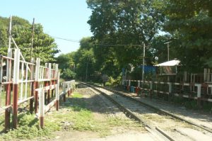 Burma, Mandalay  Maha Ganayon Kyaung Monastery; rail tracks (active?)