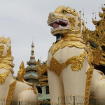 Burma, Rangoon; guardian lions at Shwedagon Pagoda