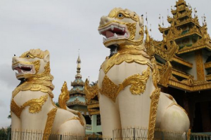 Burma, Rangoon; guardian lions at Shwedagon Pagoda