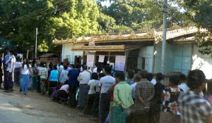 Burma, Mandalay; people waiting to vote; during our visit in November 2015