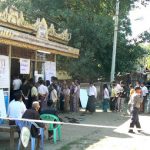 Burma, Mandalay; people waiting to vote; during our visit in November 2015