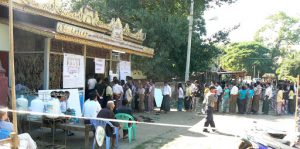 Burma, Mandalay; people waiting to vote; during our visit in November 2015