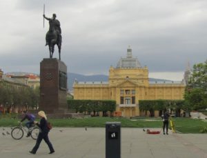 Croatia, Zagreb: national archives building with heroic statue