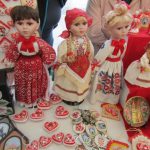 Croatia, Zagreb: dolls in traditional costumes in market square