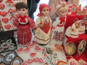 Croatia, Zagreb: dolls in traditional costumes in market square