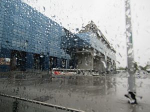 Croatia, Zagreb: view of library through rain splattered window of