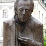 Slovenia, Ljubljana center; realistic statue of Gustav Mahler; he seems