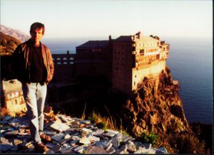 Greece: Mount Athos: Michael outside Simonpeter monastery; slate-like stones on ground