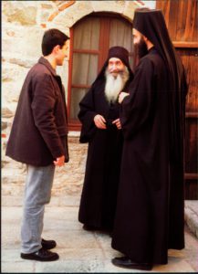 Greece: Mount Athos: monks and visitor at Simonpeter monastery